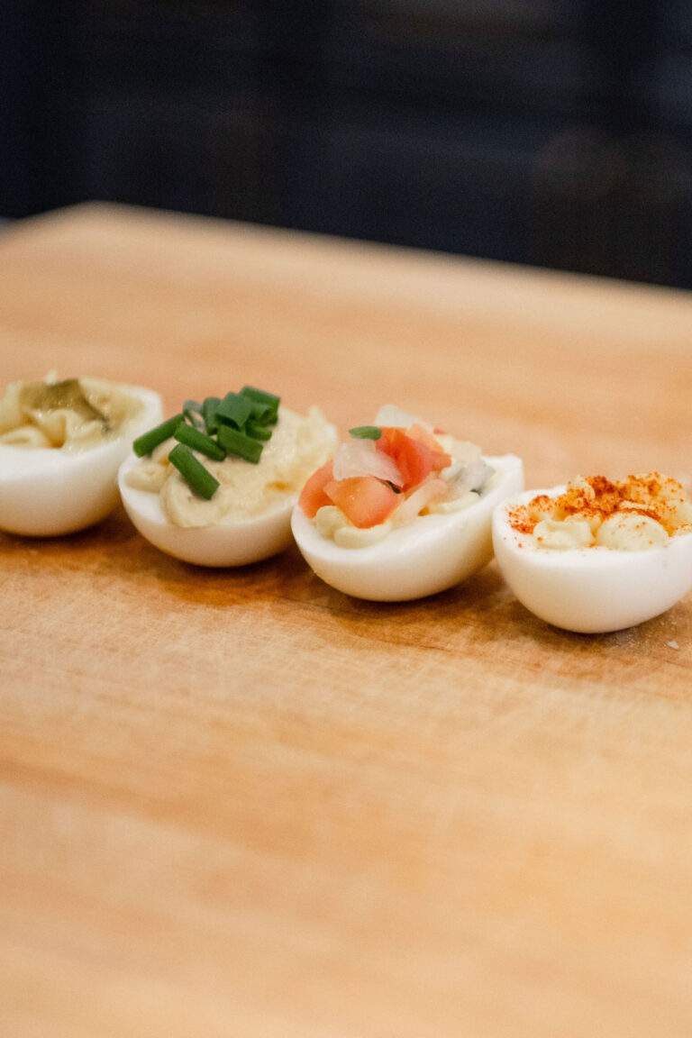 Deviled eggs created from a classic recipe resulting in various flavors.