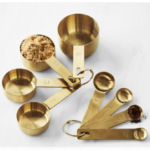Gold measuring spoons and cups