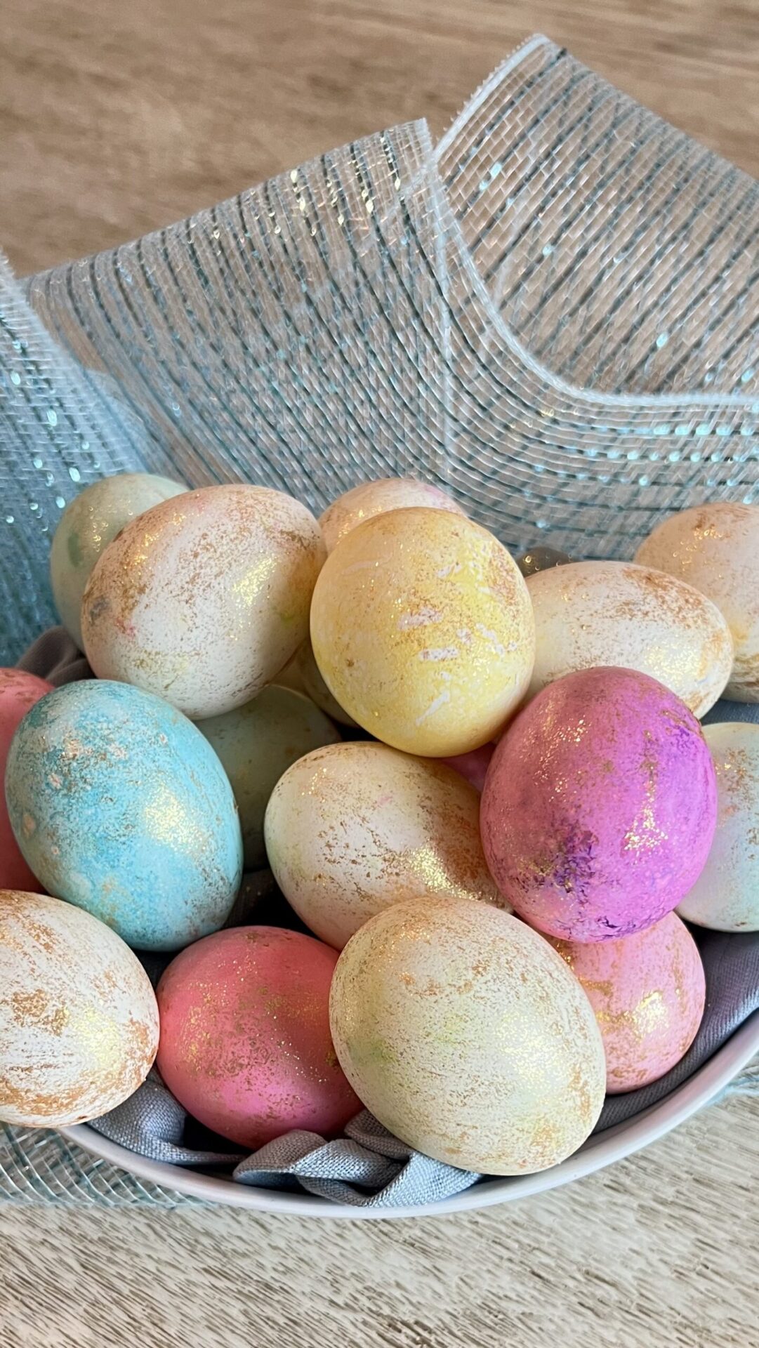 Gilded easter eggs nestled in a bowl